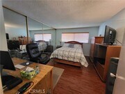 Photo - 2391 Via Mariposa W Condo Unit 1E