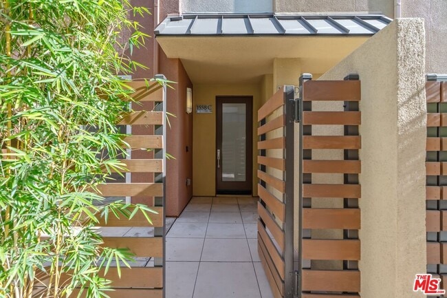 Building Photo - 1558 W Artesia Square Unit C