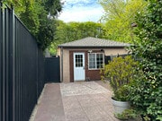 Front entrance and shared courtyard - 10809 Huston St