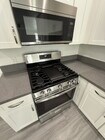 Photo - New Gas Range & Refrigerator.  Spacious rooms, private yard and RV parking.  Must see - Won't las... Unit U1