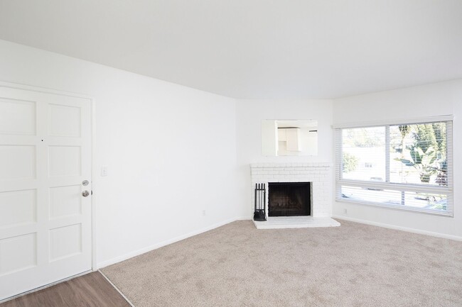 Photo - Large Upstairs Unit w/ a Fireplace
