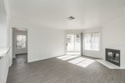 2BR, 2BA - 935SF - Living Room - Desert Oasis Apartments