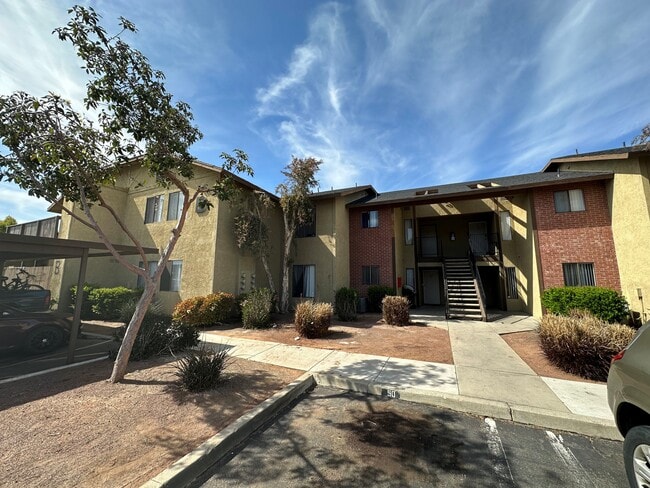 Landscaping in front of units at Riverdale Apartment Homes in Hemet, California. - Riverdale Apartments