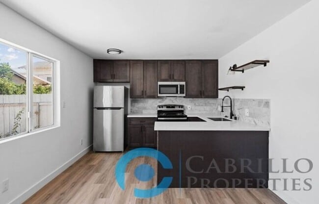 Photo - 207 E 1st St