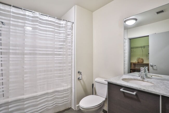 Photo - 645 W 9th St Unit 201