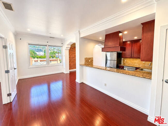 Building Photo - 1236 Flores St Unit 405