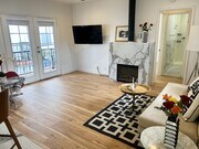 TV mount and fireplace - 3207 30th St Apartment