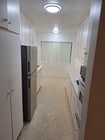 Kitchen Entry Quartz counter - 3229 Glenhurst Ave Apartments