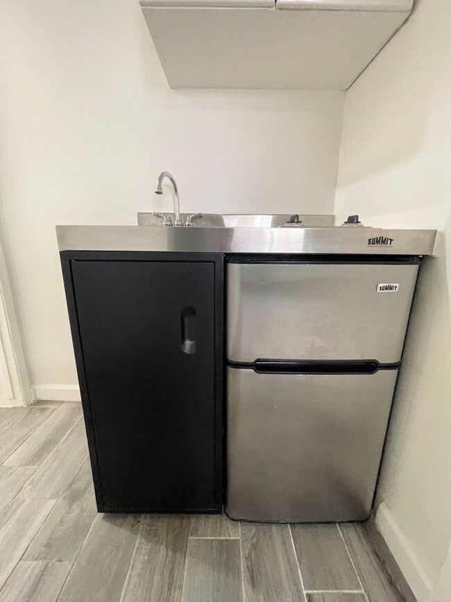 Photo - ALL Utilities included! Nicely updated studio with small kitchen, AC and Heater! Unit #1B
