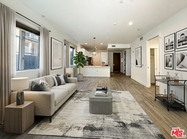 Building Photo - 6001 Carlton Way Unit 101