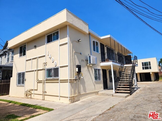 Building Photo - 1499 W 35th Pl Unit 4