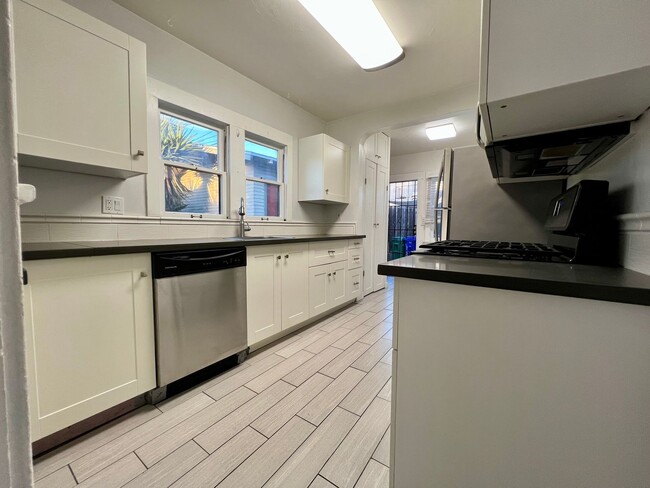 Photo - North Park Cottage! LARGE ENCLOSED PRIVATE BACKYARD! Washer & Dryer! Assigned Parking! Unit 3409 Grim Ave