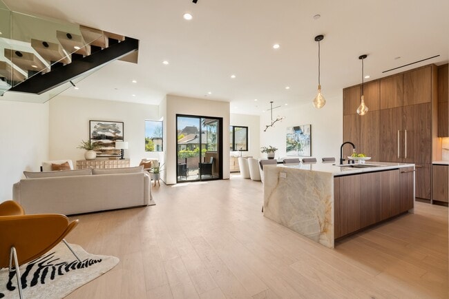 Main floor filled with natural light and an inviting open-concept layout - 836 Waterloo St House