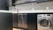 Kitchen with Washer/Dryer unit - 6474 Cavalleri Rd Condo Unit 6474
