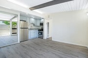 Living Room, Kitchen, Entrance to Bedroom - 11301 Gladwin St Apartment Unit 11301