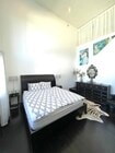 Primary bedroom 24ft ceilings - 1422 Hi Point St Townhome
