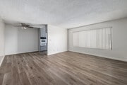 2BR, 2BA - 842SF - Living Room - The Burbank Towers