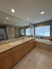 Master bath with sunken tub and shower - 23446 Blythe St House