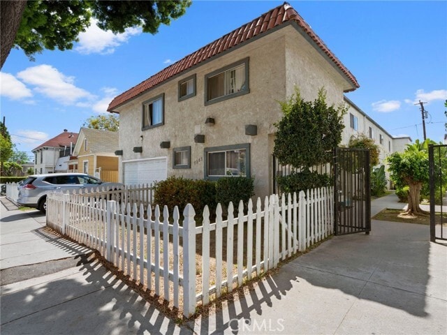 Building Photo - 7247 Milton Ave Unit 9