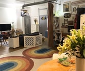 Open living space, looking from kitchen into living room. - 108 W 2nd St Unit #212