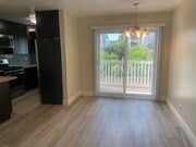 Vinyl slider that opens to a private balcony. - 2411 Prospect Ave Unit 107