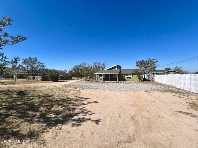 Building Photo - 13237 E Ave W 8