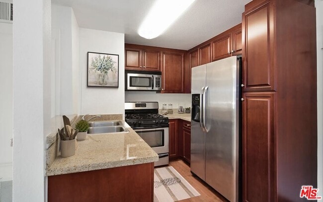 Photo - 5545 Canoga Ave Unit 203