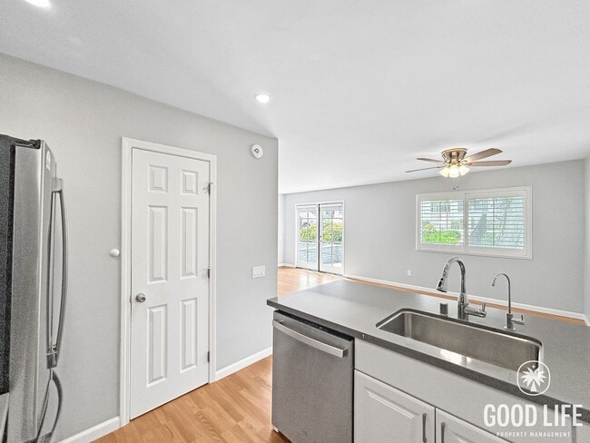 Photo - Spacious 2B/1.5BA Condo in Bay Park! Reserved Parking, Balcony, Fireplace Display & Pool! Unit 2