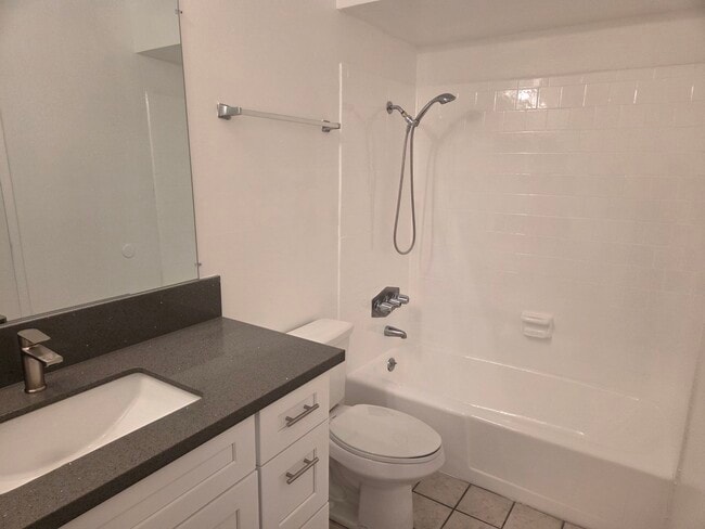 Master Bathroom with new cabinets and quartz countertops - 3455 Elm Ave Unit #215