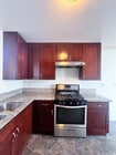 kitchen - 215 N Mariposa Ave Apartments
