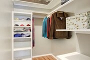 Spacious walk-in closet with wood-style floors - Fourth Avenue