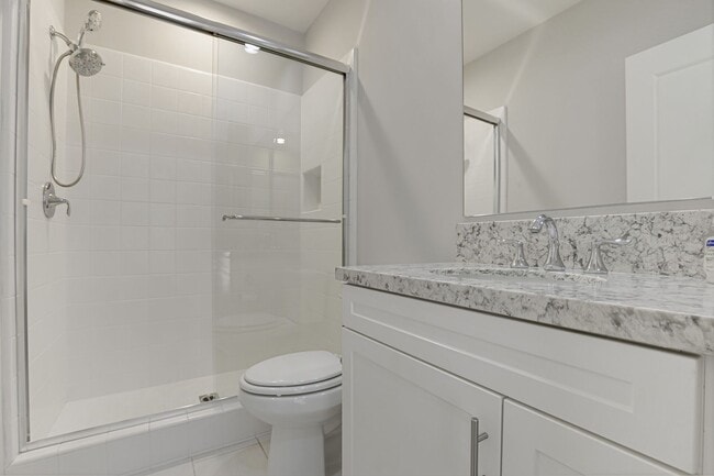 Photo - For Lease – 4 Bed / 3 Bath Townhome with 2-Car Garage