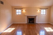 Living room, Batchelder fireplace - 844 N Laurel Ave House