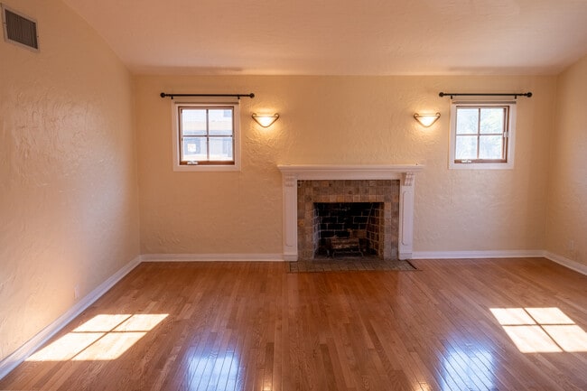 Living room, Batchelder fireplace - 844 N Laurel Ave
