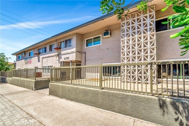 Building Photo - 6735 Elmer Ave Unit 9