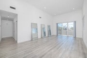 4BR, 3BA - 1,200SF - Living Room - 4550 W 18th St