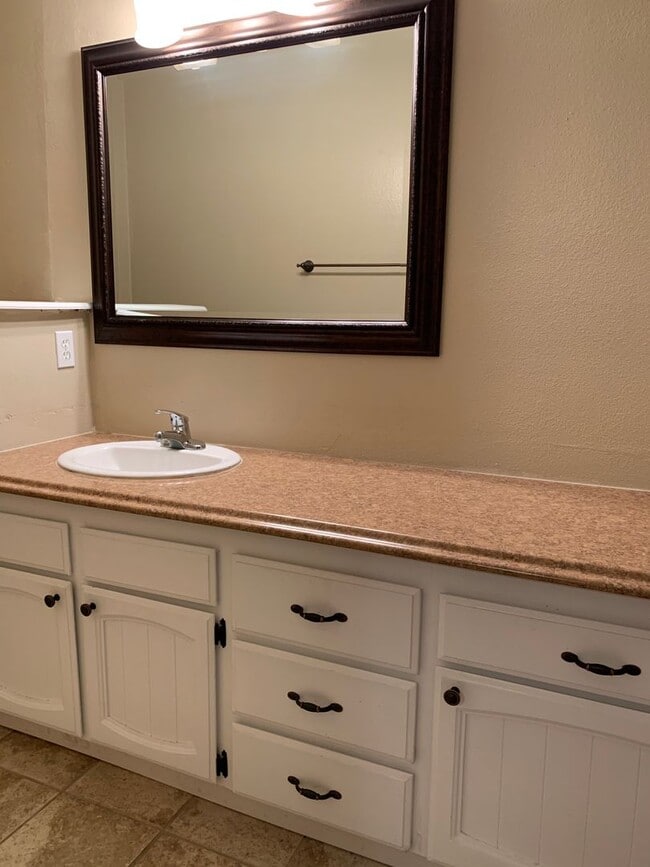 Photo - Two-bedroom Tri-Level Condo Unit E