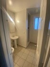 Different angle that includes pedestal sink. - 1825 Wilcox Ave Unit 200