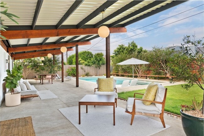Photo - A Fully Furnished Modern Portfolio Home with a Large Backyard Oasis & 3 Comfortable Bedrooms!
