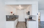 F and E plan / Up or Dwn / 1x1 - Chateau De Ville Apartments