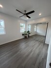 Large bedroom comfortably houses a full/queen size bed and furniture. - 9300 Benson Way Apartments Unit B