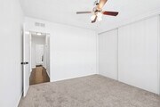 2BR, 2BA - 945SF - Primary Bedroom - Prospect Plaza Apartments
