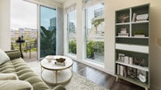 Living Room with Balcony and Hard Surface Flooring - Radius Koreatown Apartments