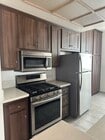 Kitchen with eat-in area - 1837 Midvale Ave Apartments