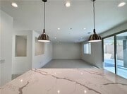 Photo - Stunning and Spacious 6BR 5BA Home w/ Solar Panels + Quartz Counter + Fenced Yard + 2 Car Garage ...