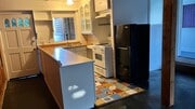 Kitchen w/frig. - 1472 Silverwood Dr Unit UpperApartment