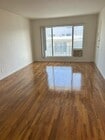Living Room - 7704 Romaine St Apartment Unit 8