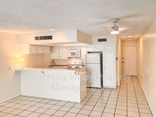 Building Photo - 1655 E Palm Canyon Dr