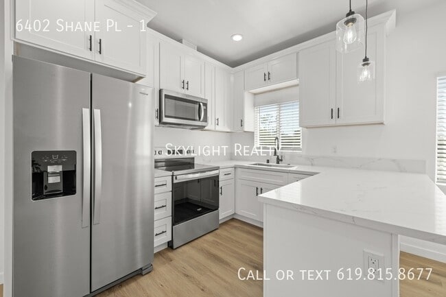 Building Photo - 6402 Shane Pl Unit 1