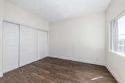 2BR, 1BA - 800SF - Primary Bedroom - Magnolia Villas